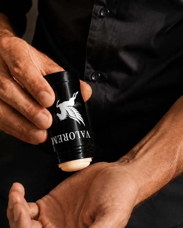 The raised wax being pressed against the inside of a wrist